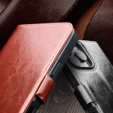 Fourre iPhone 16 Pro - Flip Qialino cuir véritable avec fermeture magnétique - Brun